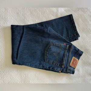 Levi’s 501 26/26. Light distress.